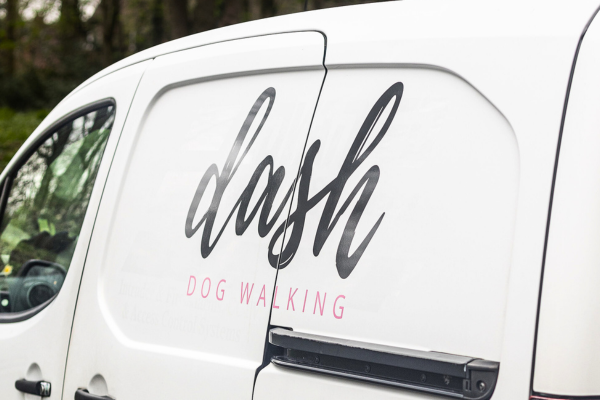 The DASH dog walking van with the DASH logo on the side